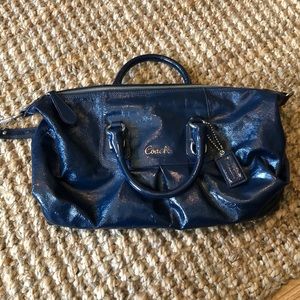 COACH. Used but in great shape blue Patent leather Coach purse.